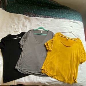 Lot of three women’s t-shirts yellow gray black